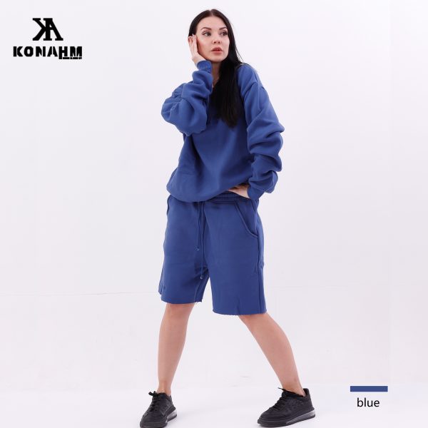 girl wearing a blue jumper/ sweater